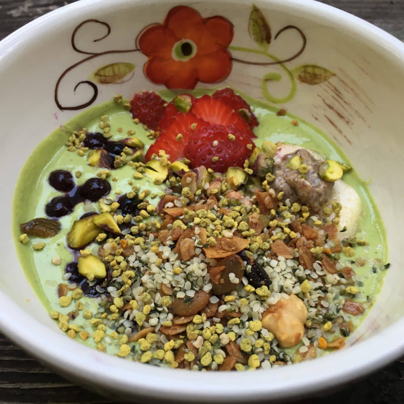 Green breakfast bowl with pistachio ‘milk’